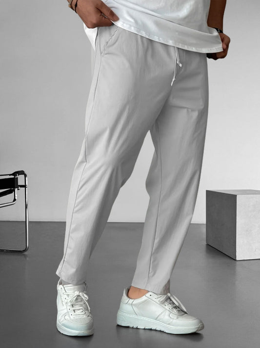 Pantalones elegantes de corte cónico con cordón