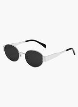 Montura plateada - lentes oscuras
