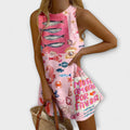 Vanesa - Vestido mini rosa con estampado Miraba