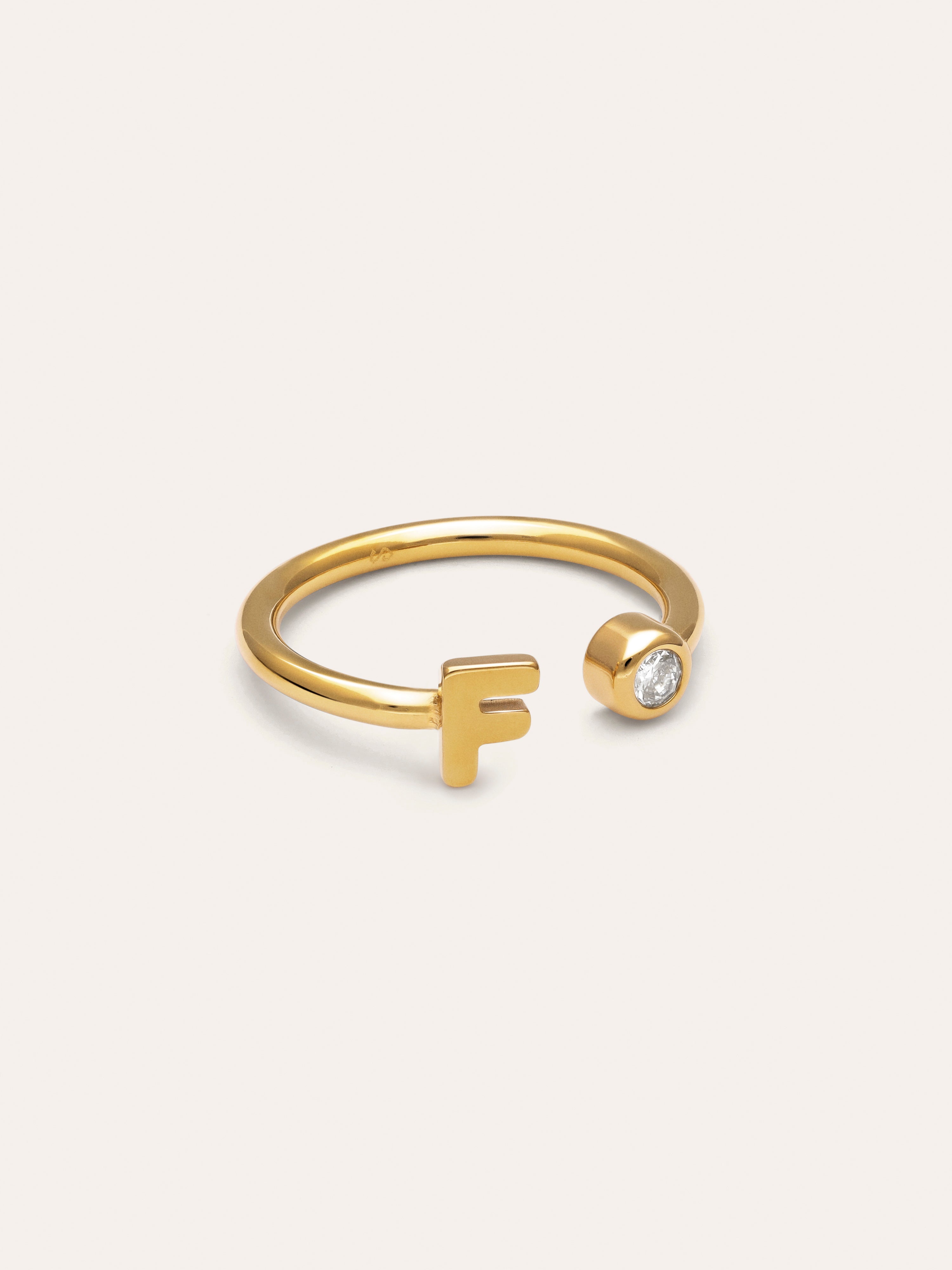 Anillo Personalizado Letter Spark Acero Baño Oro